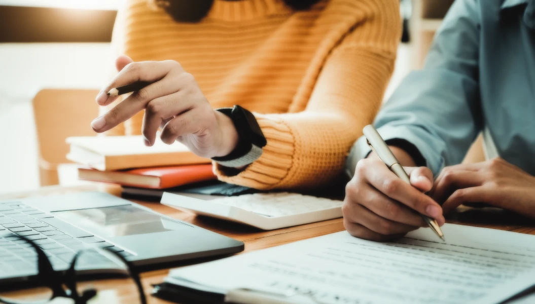 professionals working at a desk